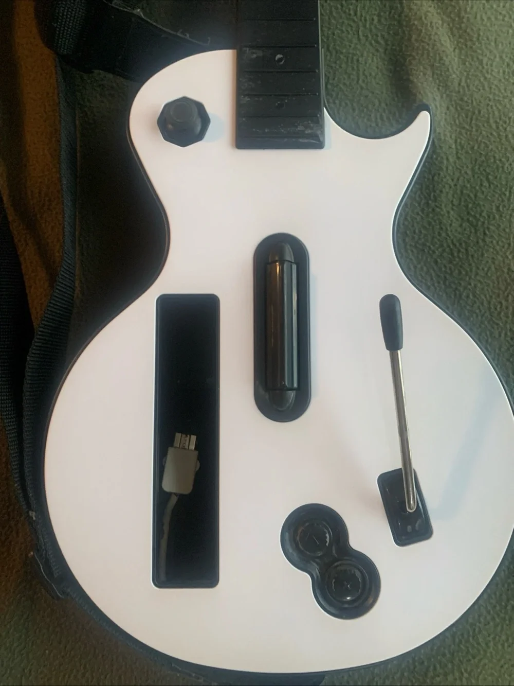 Les Paul Controller for Nintendo Wii. Black and white. 29” x 10” x 4”.